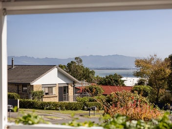 Stylish Coastal Living with Development Upside