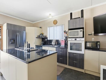 Villa on Corner Section with Great Shedding!!