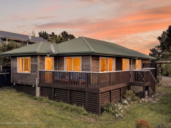 Sun, views and easy living - owners moving on