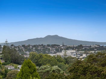 Elevated North Shore Living with Coastal Charm!