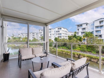 Exceptional Scale. Renovated. Lakeside Position