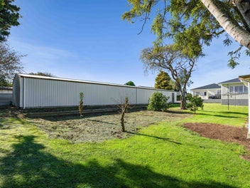 Substantial Home & Garaging + 196m2 Shed!