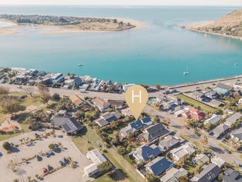 A Rare Opportunity To Own a 1/4 Acre Coastal Abode