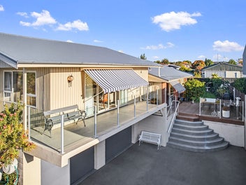 Beautiful on Bucknell - with Garaging Galore!