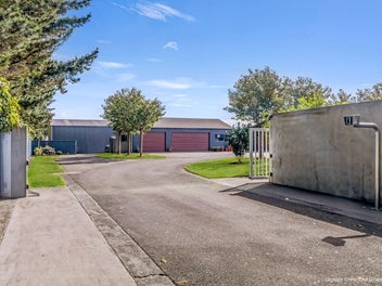 Executive Coastal Lifestyle with Sheds & Sea Views