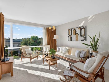 Freehold mid-century beauty with views and garden