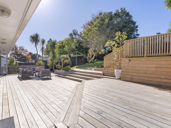 White Weatherboard Charm with a Showstopper Deck