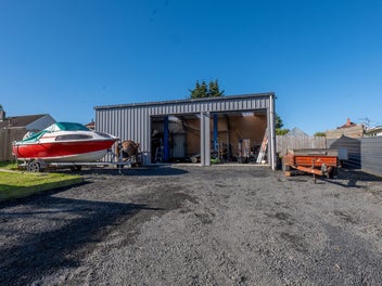 Modernised for her, and garage for him.