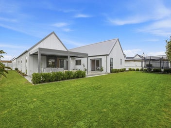 A Striking Home Anchored in Character!