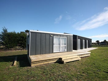 7.3 Acres, 2 Titles, 18x9 Shed & Tiny Home!