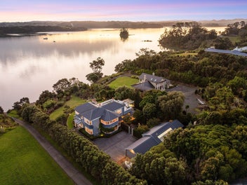 Absolute Waterfront Elegance with Riparian Rights