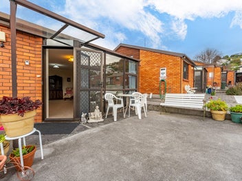 Immaculate Easy-Care Living in Prime Location