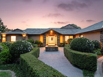 Home & Income Paradise with Subdivision Potential!