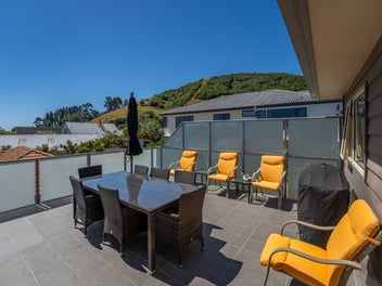 Dual Living Potential and Tranquil Water Views!