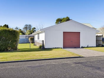 Corner Site Living with Impressive Garaging
