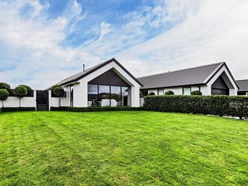 Modern, two living spaces, four bedrooms.