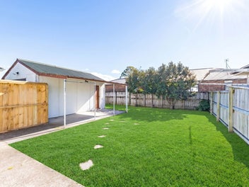 Refurbished Home with a Sunny Fenced Backyard