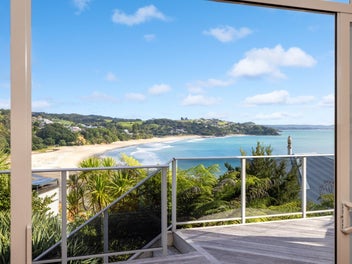 Coastal luxury with panoramic Langs Beach views