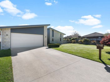 Stylish family living in a peaceful cul-de-sac