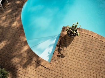 Poolside Living with Elevated Outlook!