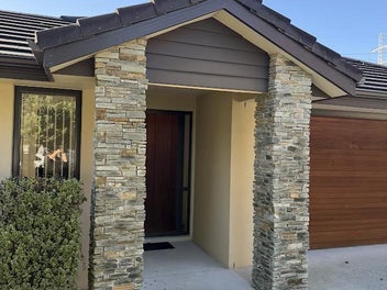 Rendered Brick and Tile Home