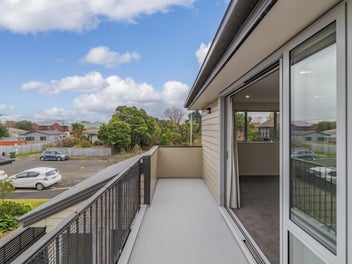 Sun-drenched living opposite Cameron Reserve