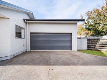 UPGRADE TO MODERN LIVING - AND GREAT GARAGING