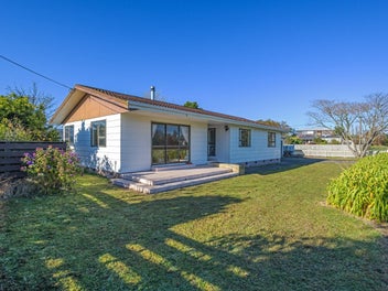 THIS FAMILY HOME IS AN ABSOLUTE STANDOUT!