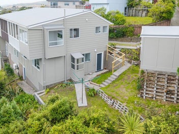 RENOVATED, ELEVATED & MOVE-IN READY