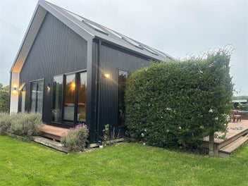 Modern stylish home with sheds and space