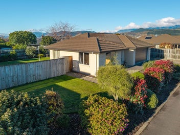Peaceful and sunny, low maintenance brick home