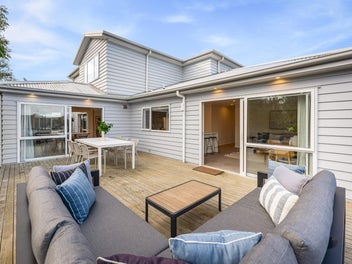 Thoughtfully Designed Home & Income