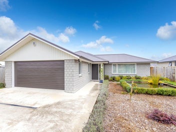 Charming Spacious Family Home with Serene Oasis