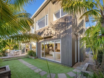 Sun-filled family living in Orakei