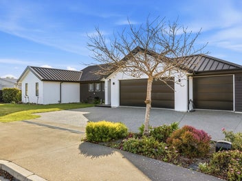 Space, Sun & Storage, Including a 3-Car Garage!
