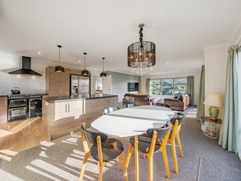 Immaculate Sun-Filled Family Living