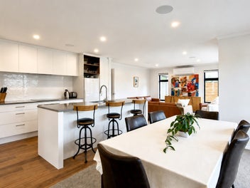 The 3 car garaging totally completes this home