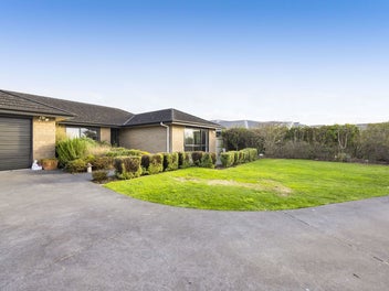 Welcome Home: Spacious 4-Bedroom Brick Retreat