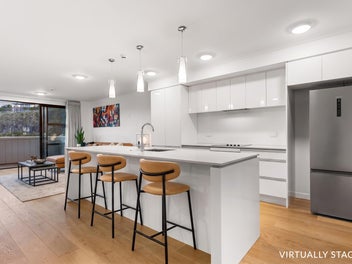 Penthouse Living with Uninterrupted Wetland Views