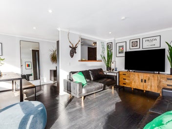 A Rare Gem – Style, Sun and Sea Views!