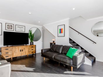 A Rare Gem – Style, Sun and Sea Views!