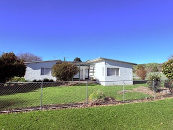 Mid-Century Classic on a Prime Corner Site