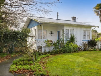 Cute Cottage with Character, Comfort & Potential
