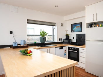 Effortless Beachfront Living with Space to Spare