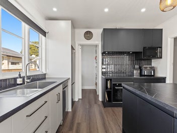 A Family Home with Modern Upgrades Awaiting You!