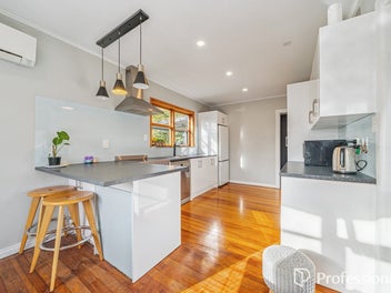 Three Bedrooms, Sleepout & Double Garaging