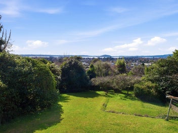 Classic Charm with Stunning Lake & City Views
