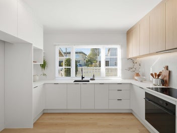 Renovated, Elevated & Moments From The Beach