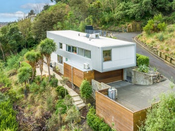 Architectural Brilliance with Hillside Serenity