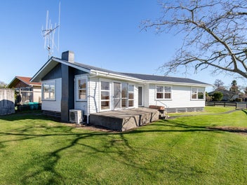 Solid, Sunny & Packed with Garage Space